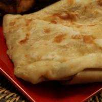 Roti is a side option · No filling. A soft warm wrap seasoned with dried chickpeas or plain, filled with meat or veg...