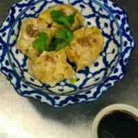 A11. Steamed Dumpling · Chicken-shrimp with soy-vinaigrette dipping sauce.