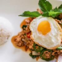 OV2. Bangkok Basil Rice · Grounded chicken in spicy basil sauce top with sunny side up egg. Authentic Thai spicy.