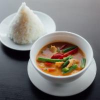 C3. Panang Curry · Coconut curry, bell peppers, lime leaves and string beans. Authentic Thai spicy. Gluten free.