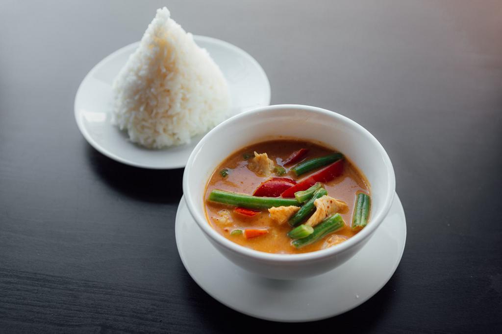 C3. Panang Curry · Coconut curry, bell peppers, lime leaves and string beans. Authentic Thai spicy. Gluten free.
