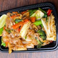 N2. Drunken Noodle · Stir fried flat rice noodles with egg, onions, bell peppers, long hot peppers, broccoli, bok...