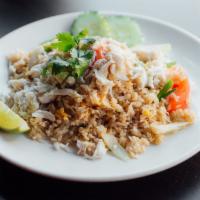 R5. Crab Fried Rice · Onions, scallions, tomatoes and egg.