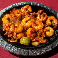 Tandoori Shrimp · Shrimp marinated in mild spices and grilled in tandoor.