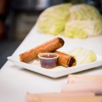 Lumpia · Filipino spring rolls- deep-fried appetizer consisting of a mixture of ground pork, carrots,...