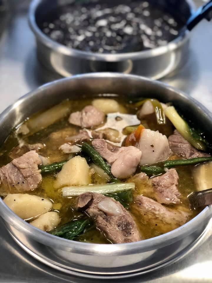 Pork Sinigang Soup  · A popular Filipino soup, rich with  its sour and savory taste.  Made with  pork  belly, rib tips, green beans, eggplant,  and bok choy.  It is one of the more popular dishes in Filipino cuisine. A must try!
