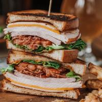 BREWER’S CLUB · Roasted turkey, ham, bacon, cheddar + Swiss, lettuce, tomato, chipotle mayo with choice of s...