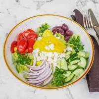 Greek Salad · Romaine hearts, cucumber, tomato, peperoncini, feta cheese, olives, red onion & balsamic dre...