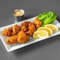 Chicken Wings  · 8 pieces. With ranch dressing. Cooked wing of a chicken coated in sauce or seasoning.