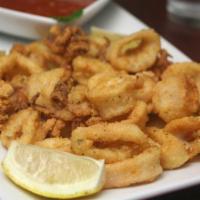 Crispy Calamari  · Squid. Fresh hand breaded in our kitchen, flash-fried to perfection, and served with our sig...