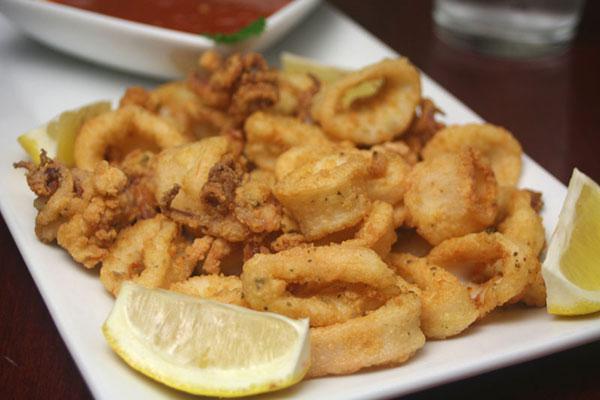 Crispy Calamari  · Squid. Fresh hand breaded in our kitchen, flash-fried to perfection, and served with our signature marinara sauce.