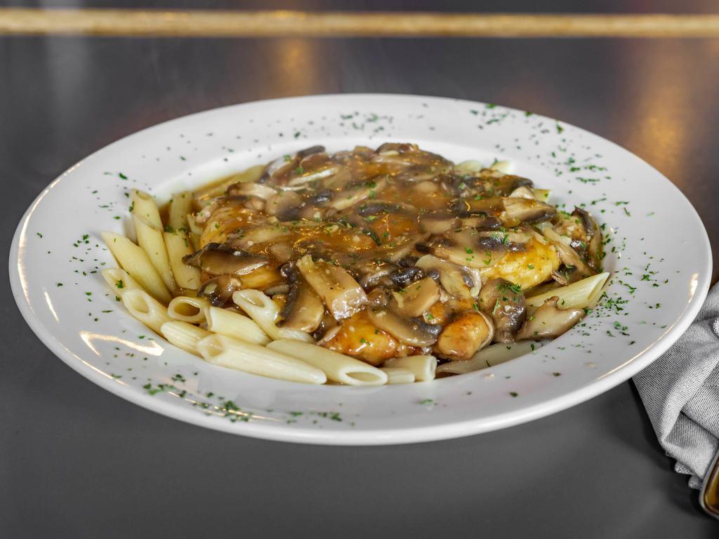 Chicken Marsala · Fresh chicken sautéed with garlic and marsala wine in a savory mushroom sauce served over your choice of pasta or rice pilaf.