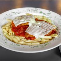 Chicken Parmigiana · Lightly fried chicken topped with marinara sauce and mozzarella cheese served over your choi...