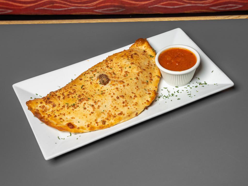 Sausage Calzone · Grilled sweet Italian sausage, onions, peppers, and mushrooms with mozzarella cheese.