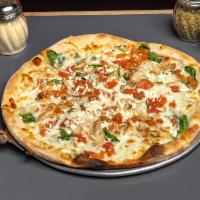 Florentine Gourmet Pizza · A white pizza with grilled chicken, olive oil, spinach, and tomatoes topped with mozzarella ...