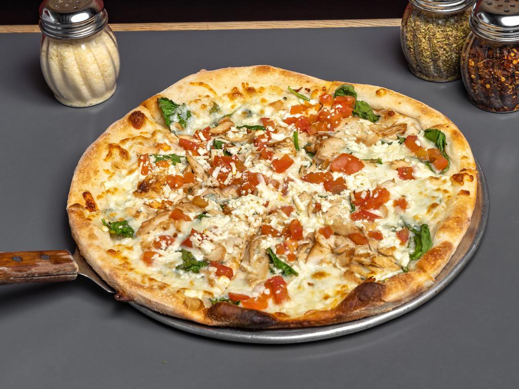 Florentine Gourmet Pizza · A white pizza with grilled chicken, olive oil, spinach, and tomatoes topped with mozzarella and feta cheese.