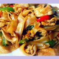 22. Drunken Noodle · Stir-fried wide rice noodles with fresh basil, onions, bell peppers and house chili pepper s...