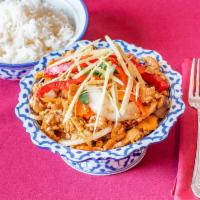31. Pad Khing · Stir-fried fresh ginger, bell peppers, onions and carrots in a house special bean sauce. Ser...