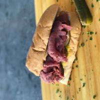 Pastrami Sub (Hot) · Lean sliced pastrami, mustard and pickles.