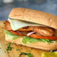 Grilled Chicken Sub (Hot) · Grilled marinated chicken breast, cheese, mayo, lettuce, tomatoes, onions, pickles and dress...