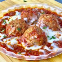 Meatballs · Four pieces. Served with homemade meat sauce and cheese.