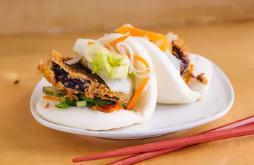 Eggplant Buns · Tempura eggplant. Warm pillowy steamed buns in special sauce. Spicy.