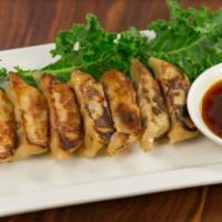 Gyoza · Pot stickers. Pork or chicken dumpling served pan-fried or deep-fried served with ponzu ging...