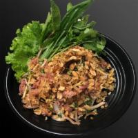 Nam Khao Tod · Crispy rice salad with sour sausage, peanut,ginger,shallot,scallion and cilantro