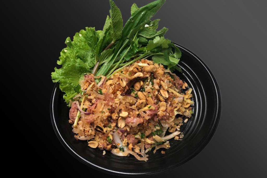 Nam Khao Tod · Crispy rice salad with sour sausage, peanut,ginger,shallot,scallion and cilantro