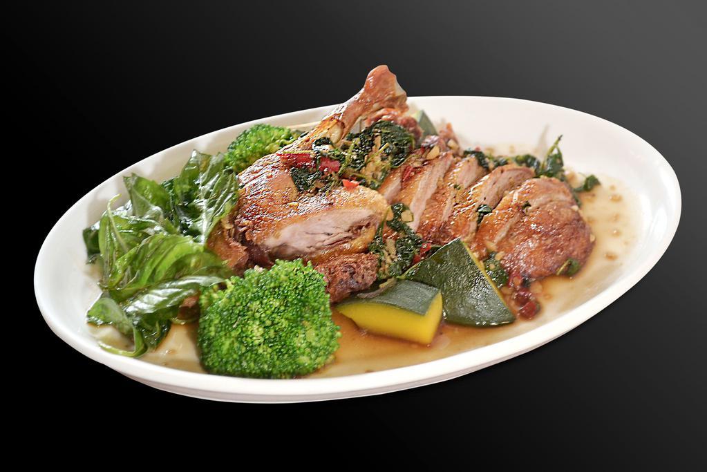 Crispy Duck Basil · Basil sauce with steamed broccoli and pumkins served with Jasmin rice.