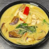 Green Curry · Green coconut curry as medium spicy with bamboo shoot, bell pepper, eggplant, basil served w...