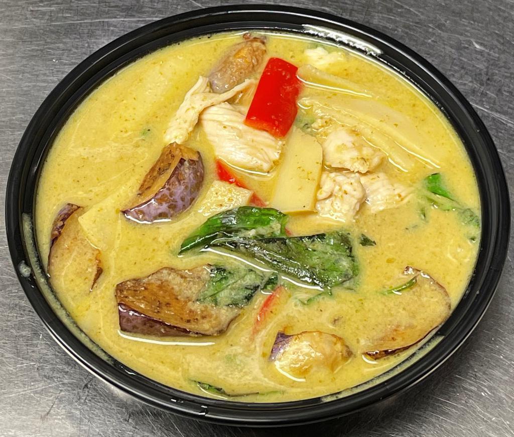 Green Curry · Green coconut curry as medium spicy with bamboo shoot, bell pepper, eggplant, basil served with Jasmin rice