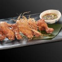 Herbs Wings · Marinated Thai Herbs chicken wings with Jeaw sauce