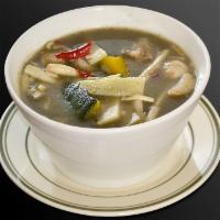Bamboo Shoot Soup · Bamboo shoot soup with pumpkins. Esan style soup with mushrooms, scallions, shallots and lem...