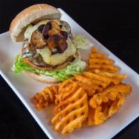 Atomic Burger · Charbroiled then tossed with atomic sauce, melted blue cheese, grilled turkey bacon, lettuce...