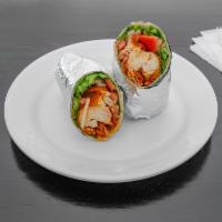 Crispy Buffalo Chicken Wrap · Our all natural Halal chicken breast fried in our famous breaded recipe, tossed in Buffalo s...