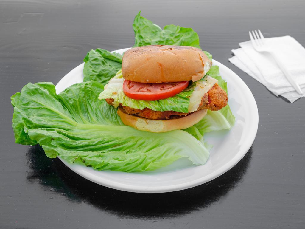 Crispy Buffalo Chicken Sandwich · Our all natural Halal chicken breast fried in our famous breaded recipe, tossed in Buffalo sauce, topped with pepper jack cheese and fresh romaine lettuce.