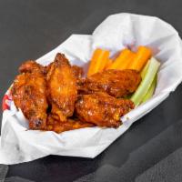 Wings · Buffalo, BBQ, or dry. Includes 1 dressing or sauce.
