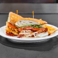 Grilled Chicken Club Sandwich · Grilled chicken, bacon, lettuce, tomato, and mayo served on a French roll.
