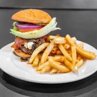 The Blue's Burger · 1/2 lb. fresh ground beef patty, blue cheese, bacon, sauteed, mushrooms, lettuce, tomato, ma...