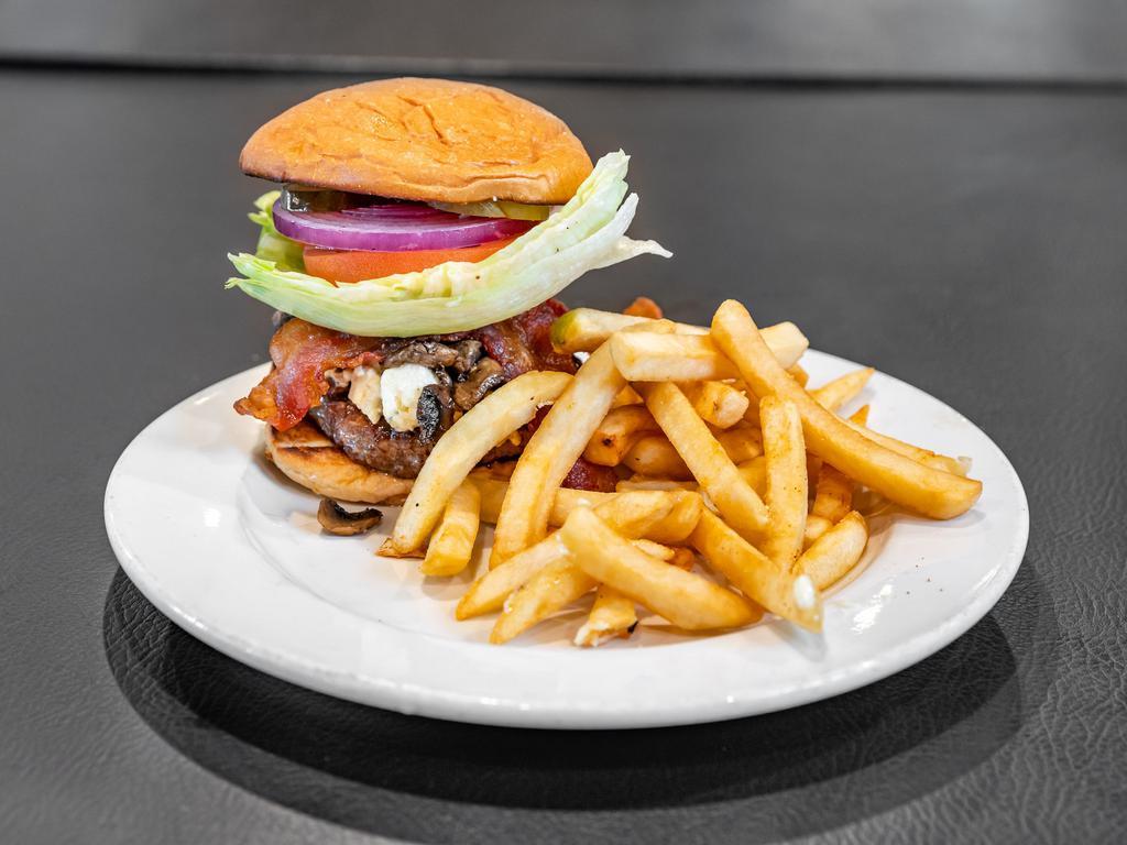 The Blue's Burger · 1/2 lb. fresh ground beef patty, blue cheese, bacon, sauteed, mushrooms, lettuce, tomato, mayo, and onion served on a brioche bun.