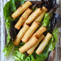 A1. Vegetable Spring Rolls · 2 pieces. Vegetarian.