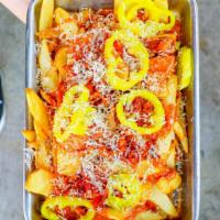 Dirty Fries · Cheese, bacon, banana peppers and BBQ ranch.