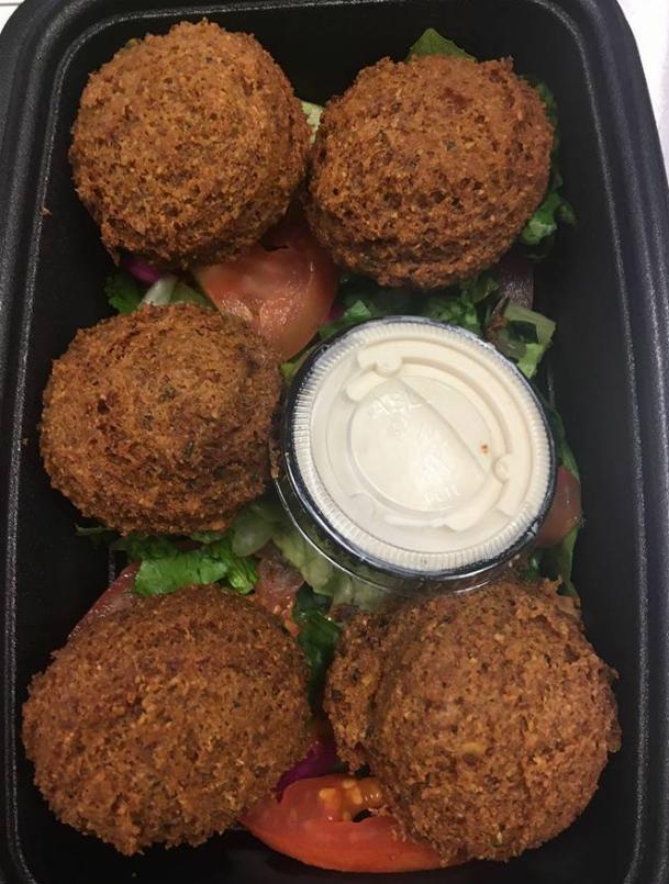 Falafel App · A blend of chickpeas, fava beans, our special spices served with tahini sauce, served with pita bread fresh from our oven. Vegetarian.