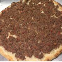 Meat Manakeesh · Our special flat dough, topped with your choice of beef shawarma, chicken shawarma, or gyro ...