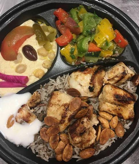 Grilled Chicken Combo Plate · Grilled chicken thigh, with hummus, feta a Greek salad.