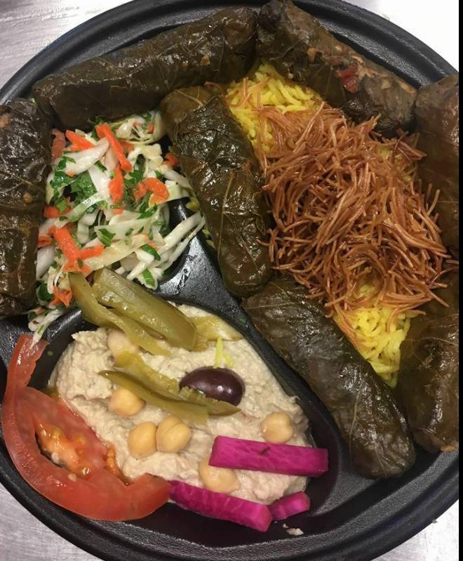 Vegetarian Combo Plate · Hummus, baba ghanouj, falafel, and Greek salad.