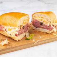 New Yorker Sandwich · Corned beef, pastrami, Swiss cheese, Russian dressing and coleslaw.