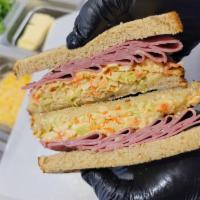 Brooklyn Sandwich · Corned beef, Swiss cheese, Russian dressing and coleslaw.