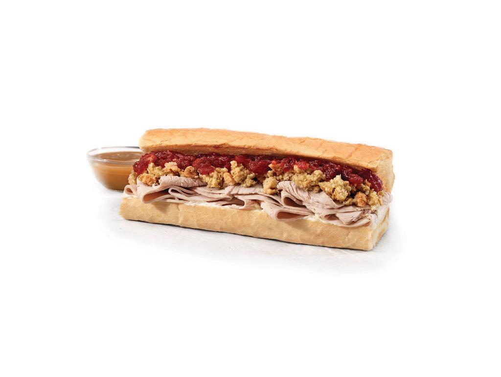 Thanksgiving Toasted (Medium) · Hand-sliced Turkey Breast, Stuffing, Cranberry Sauce & Mayo, served with a side of Hot Gravy, toasted to perfection.